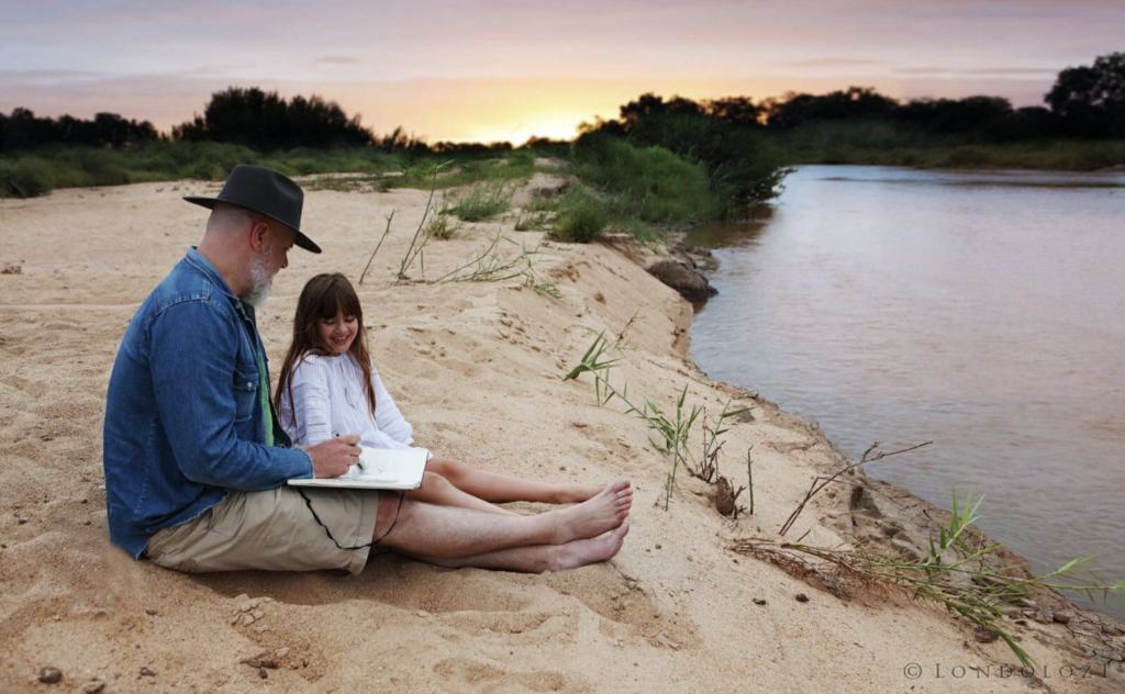 Father & Daughter on the river bank 